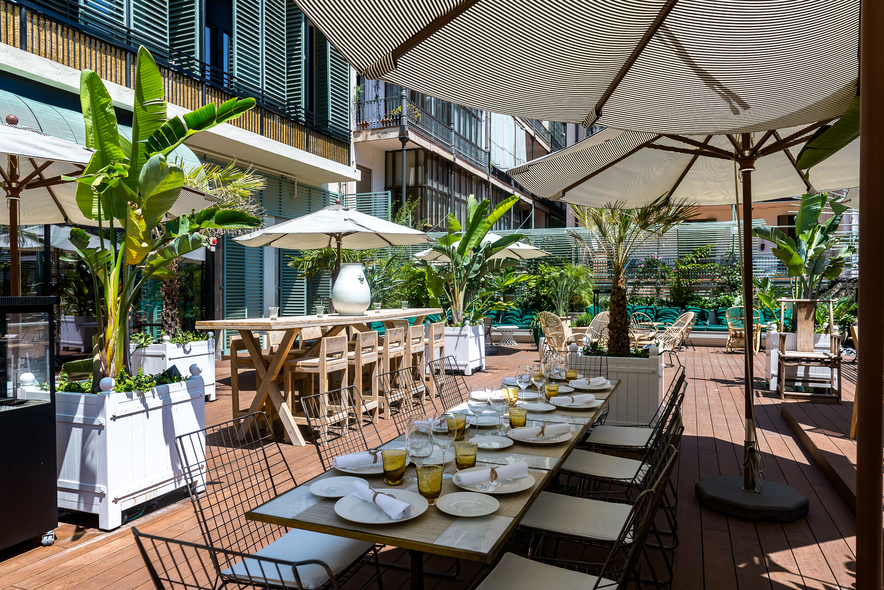 Terrace restaurant seating area at the Cotton House Hotel in Barcelona