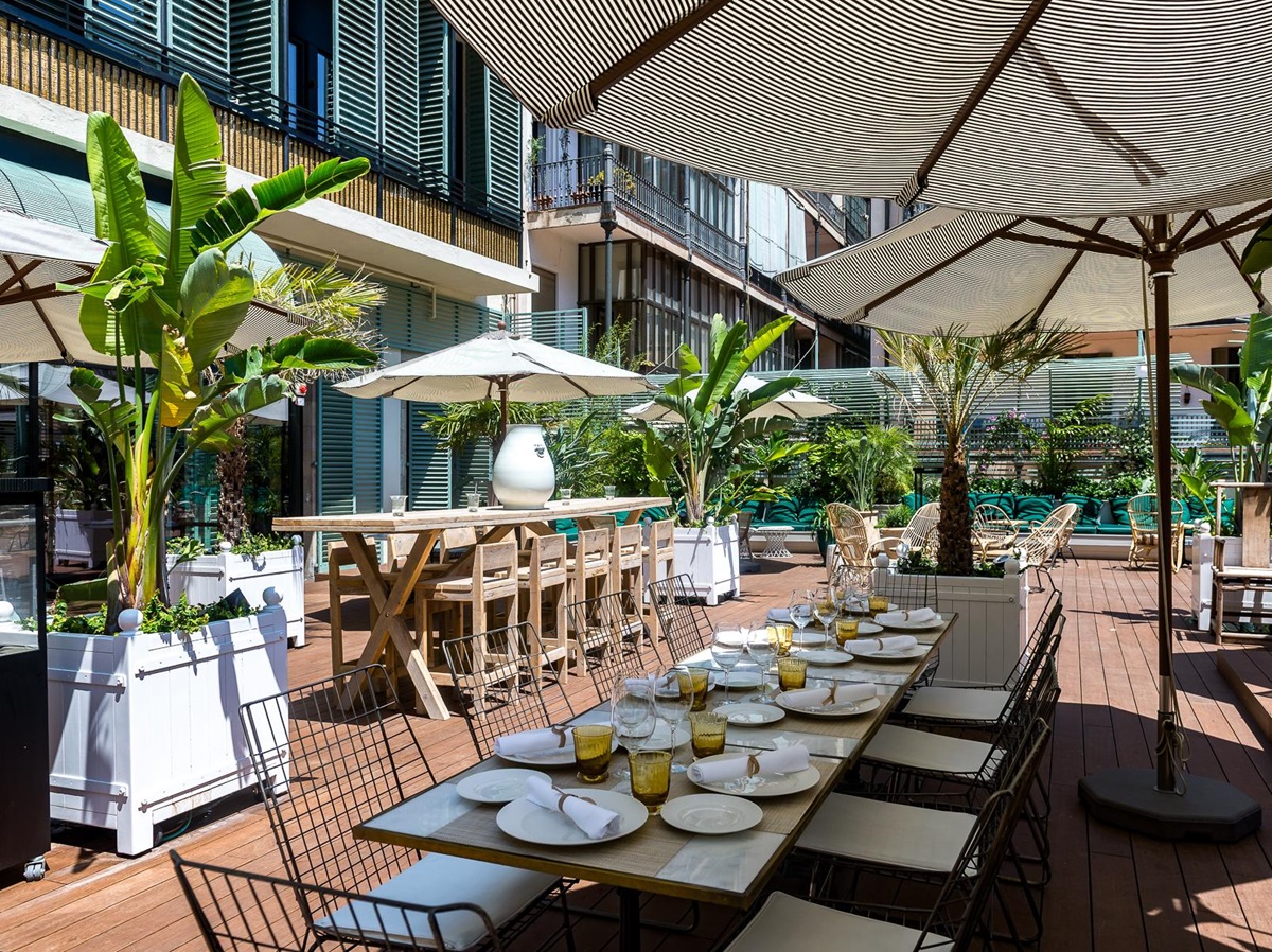 Terrace restaurant seating area at the Cotton House Hotel in Barcelona