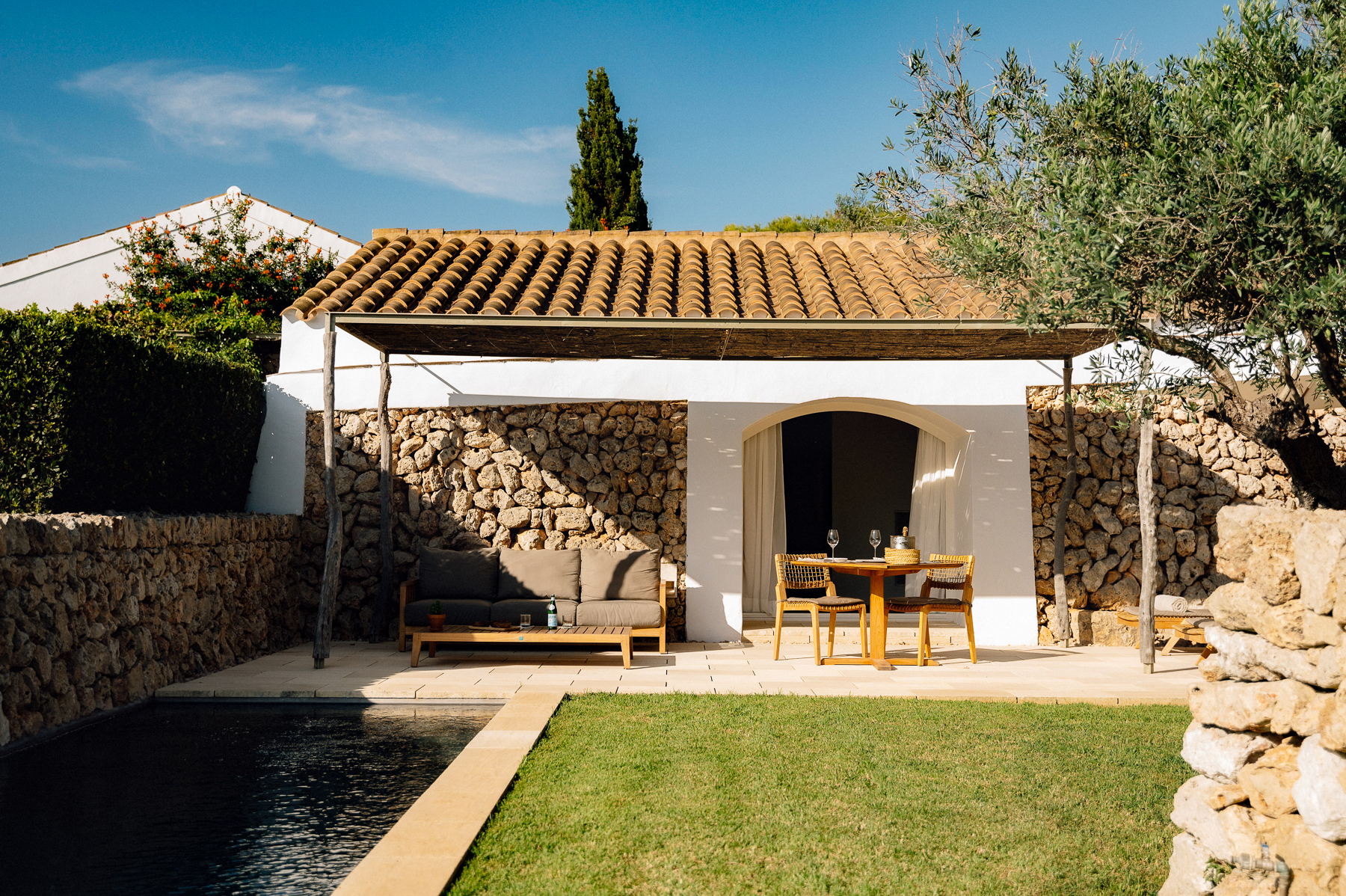 Exterior view of the Pool Cottage residence at Hotel Torralbenc in Menorca