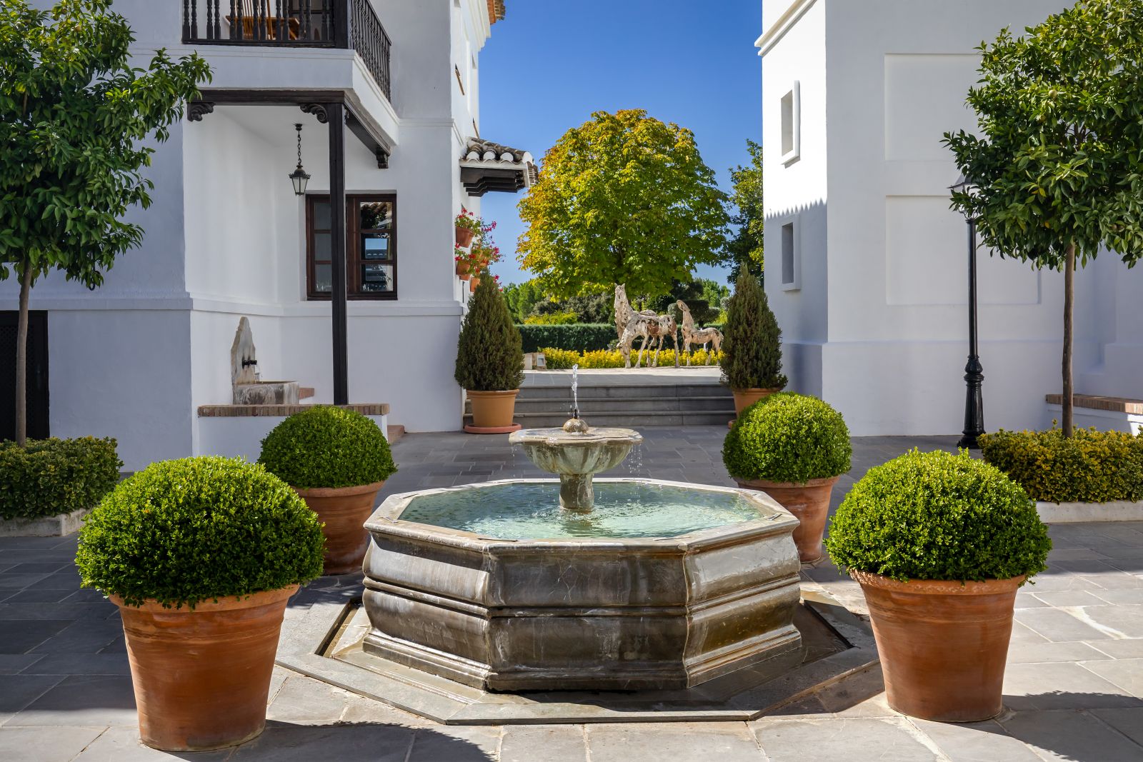 Courtyard with fountain at luxury resort La Bobadilla near Grenada, Spain