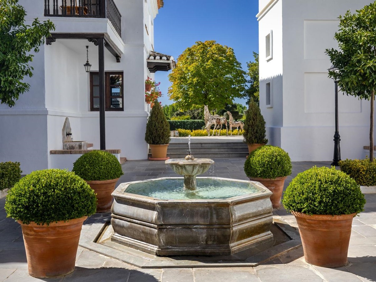 Courtyard with fountain at luxury resort La Bobadilla near Grenada, Spain