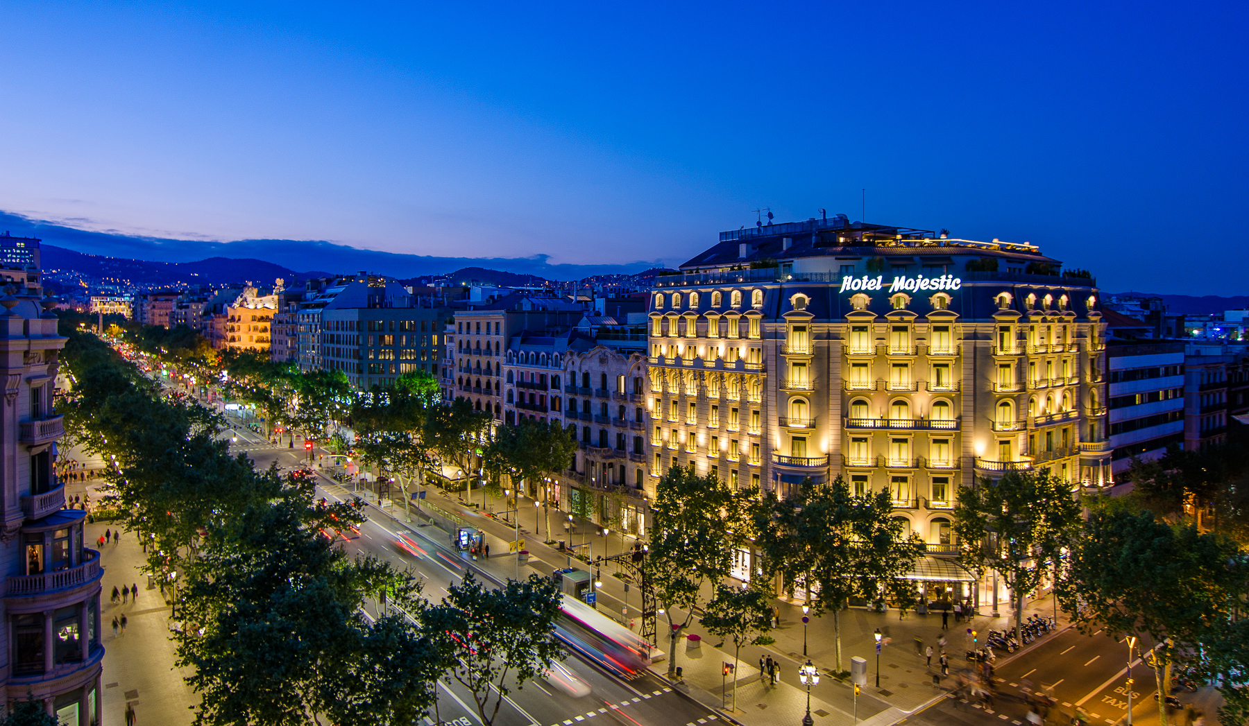 Exterior view of the Majestic Hotel & Spa in Barcelona at night