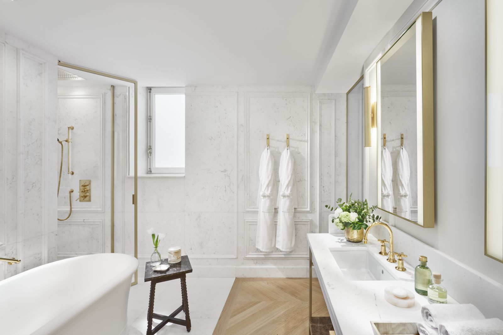White marble bathroom of a Turret Suite at luxury hotel Mandarin Oriental Ritz Madrid