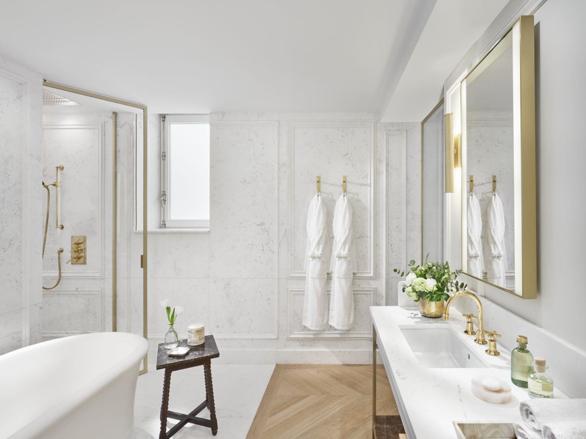 White marble bathroom of a Turret Suite at luxury hotel Mandarin Oriental Ritz Madrid