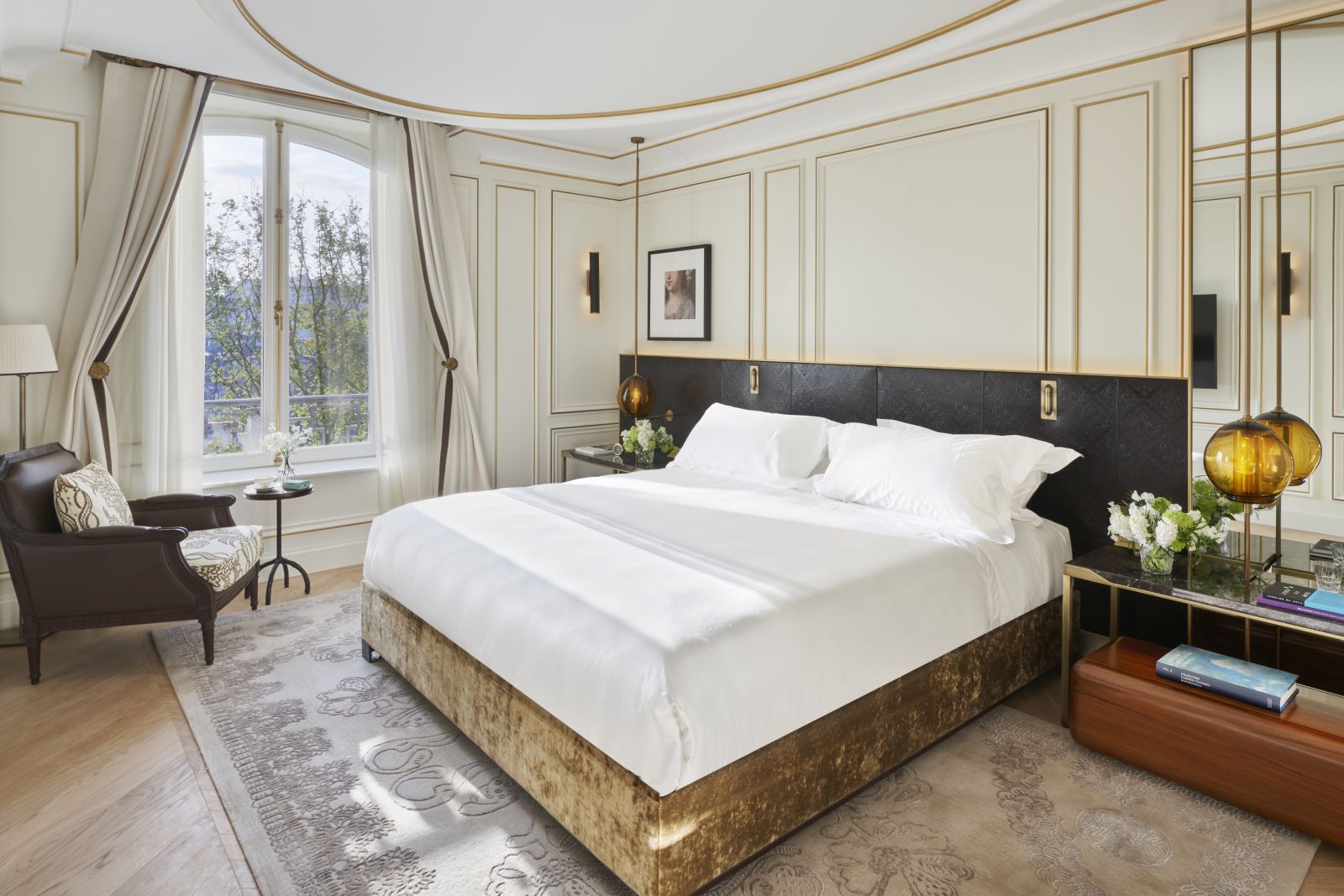 Spacious bedroom of a Turret Suite at luxury hotel Mandarin Oriental Ritz Madrid