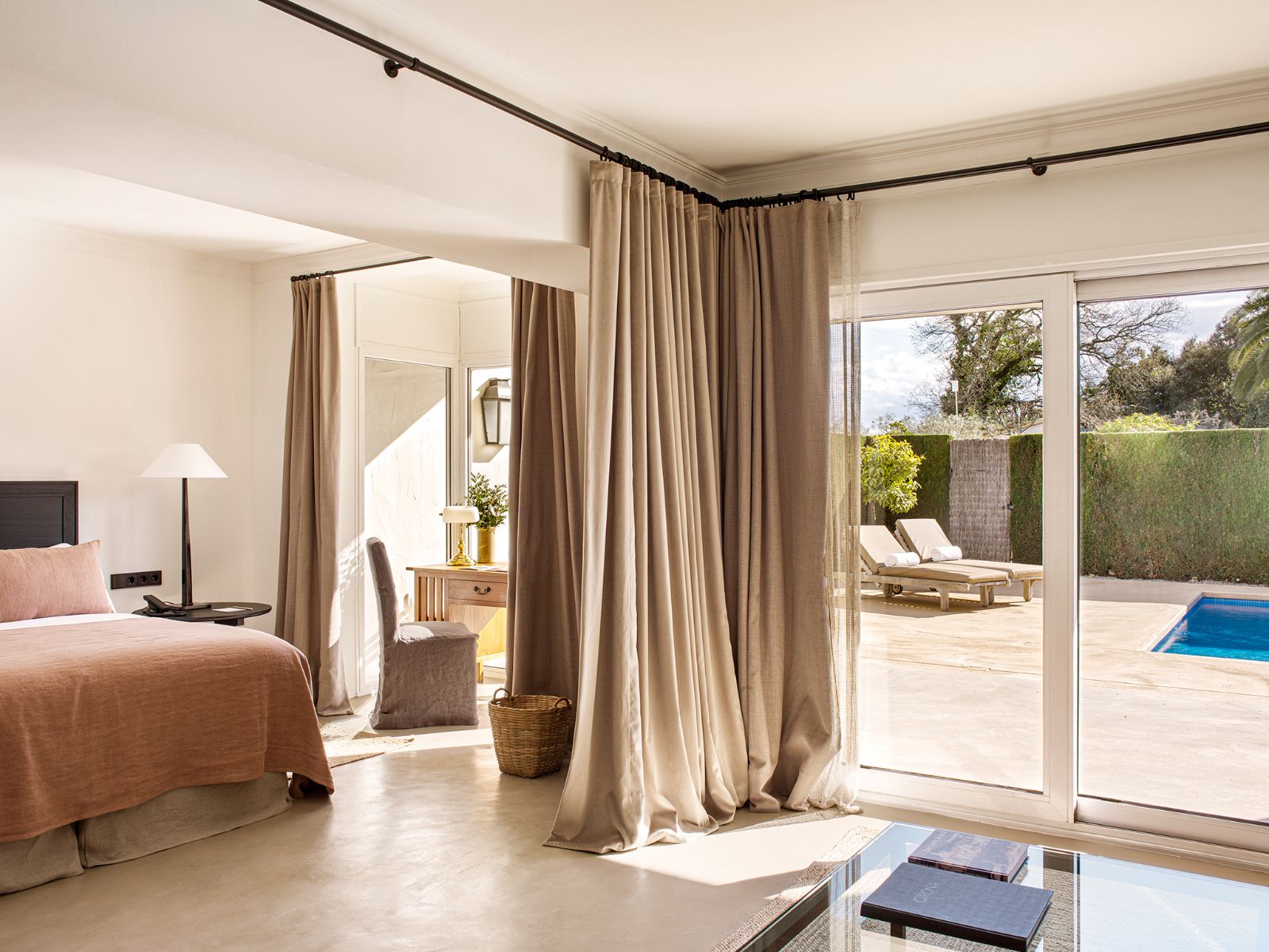 Bedroom of a pool villa with access to a private terrace with pool at luxury hotel Mas de Torrent in Spain