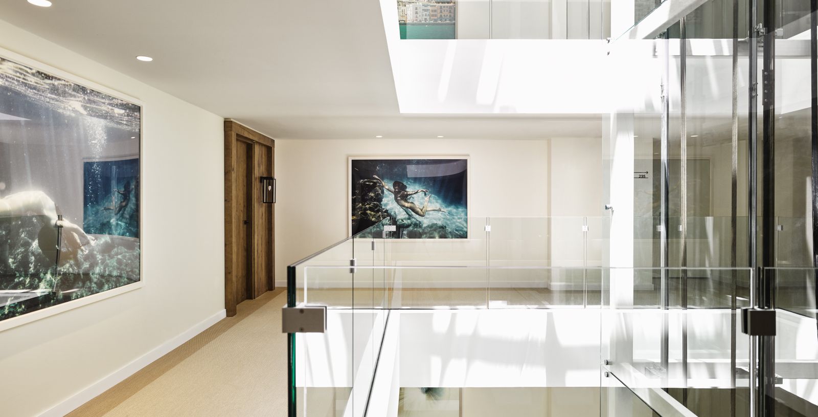 Corridor with underwater art at luxury hotel Nobu Ibiza