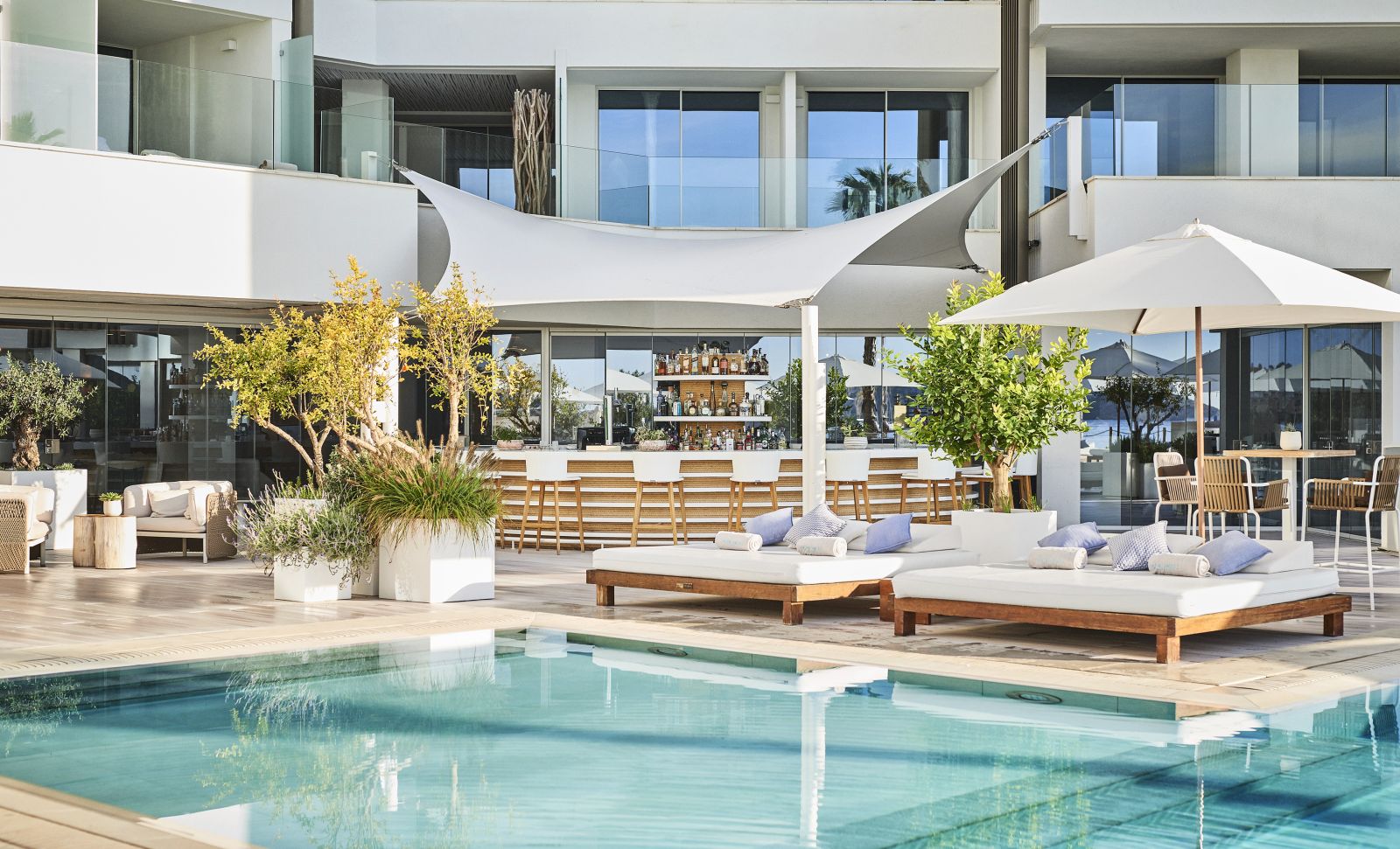 Pool Bar and sun loungers at luxury hotel Nobu Ibiza