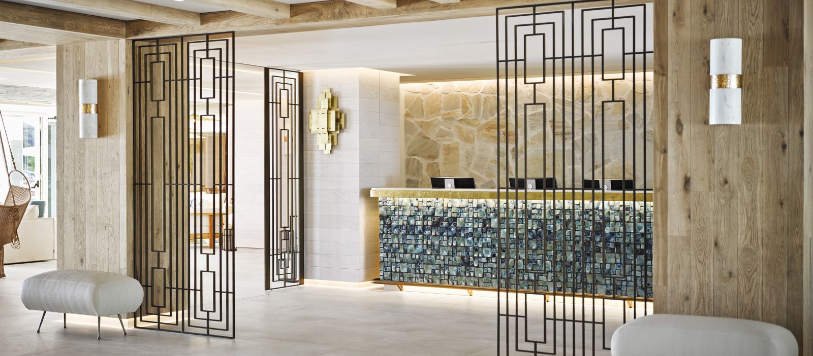 Reception with stylish wall panels and art at luxury hotel Nobu Ibiza