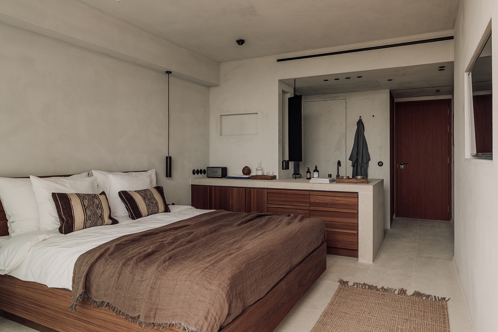 Bedroom with open bathroom at luxury resort OKU Ibiza