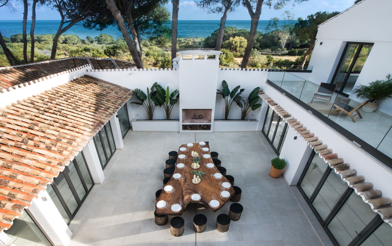 View of the terrace and beach at Villa Artola, near Marbella