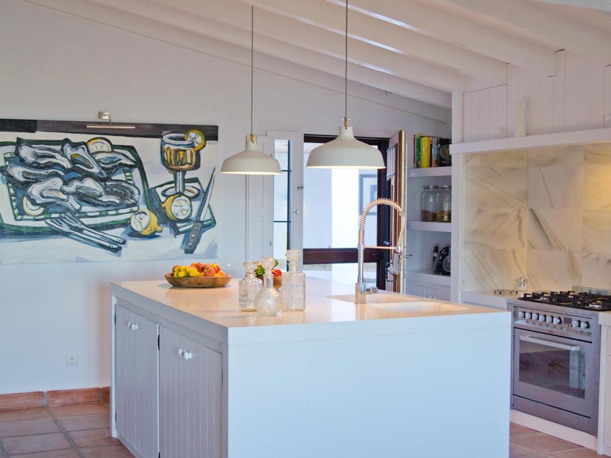 Kitchen with art in El Refugio, Andalucia