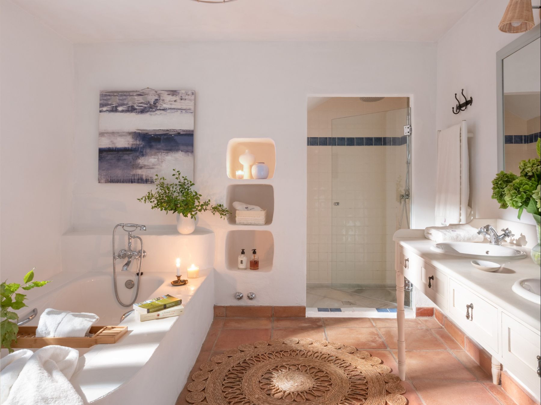 Bathroom with bathtub and shower at Finca Flores, Andalucia