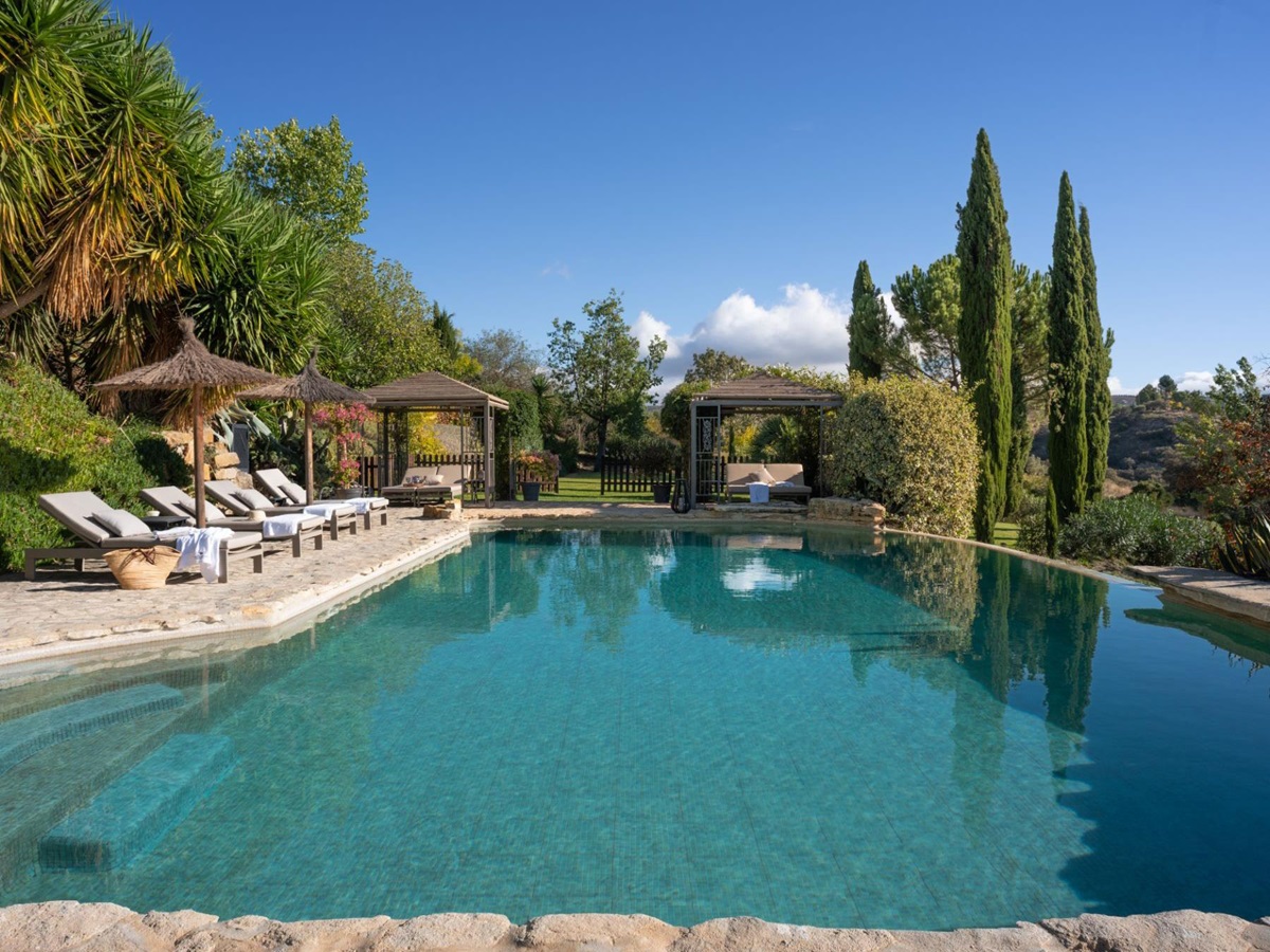 Pool and sun loungers at Finca Flores, Andalucia