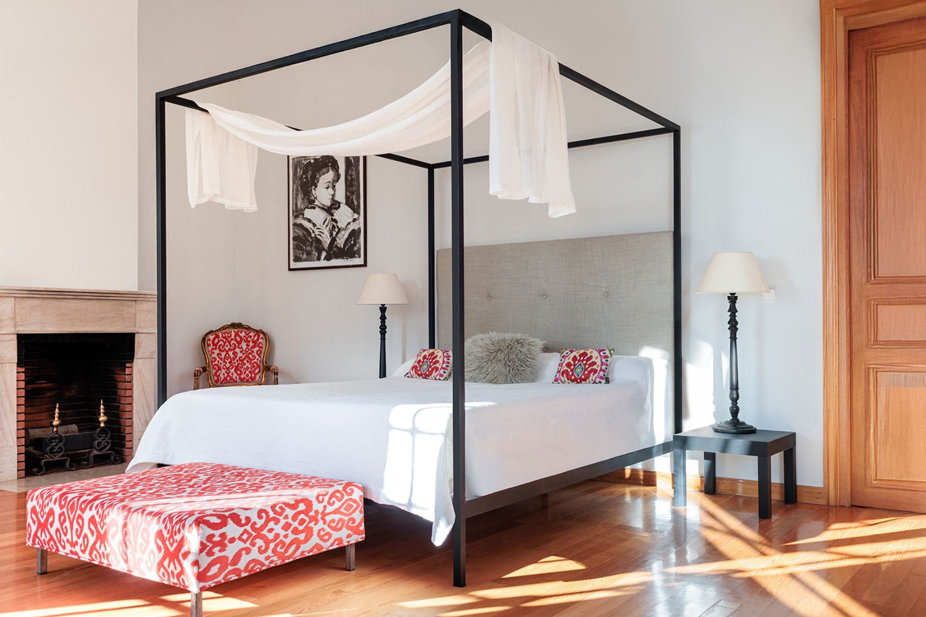 Double bedroom with four poster bed at Finca Jardin Bonito, Andalucia