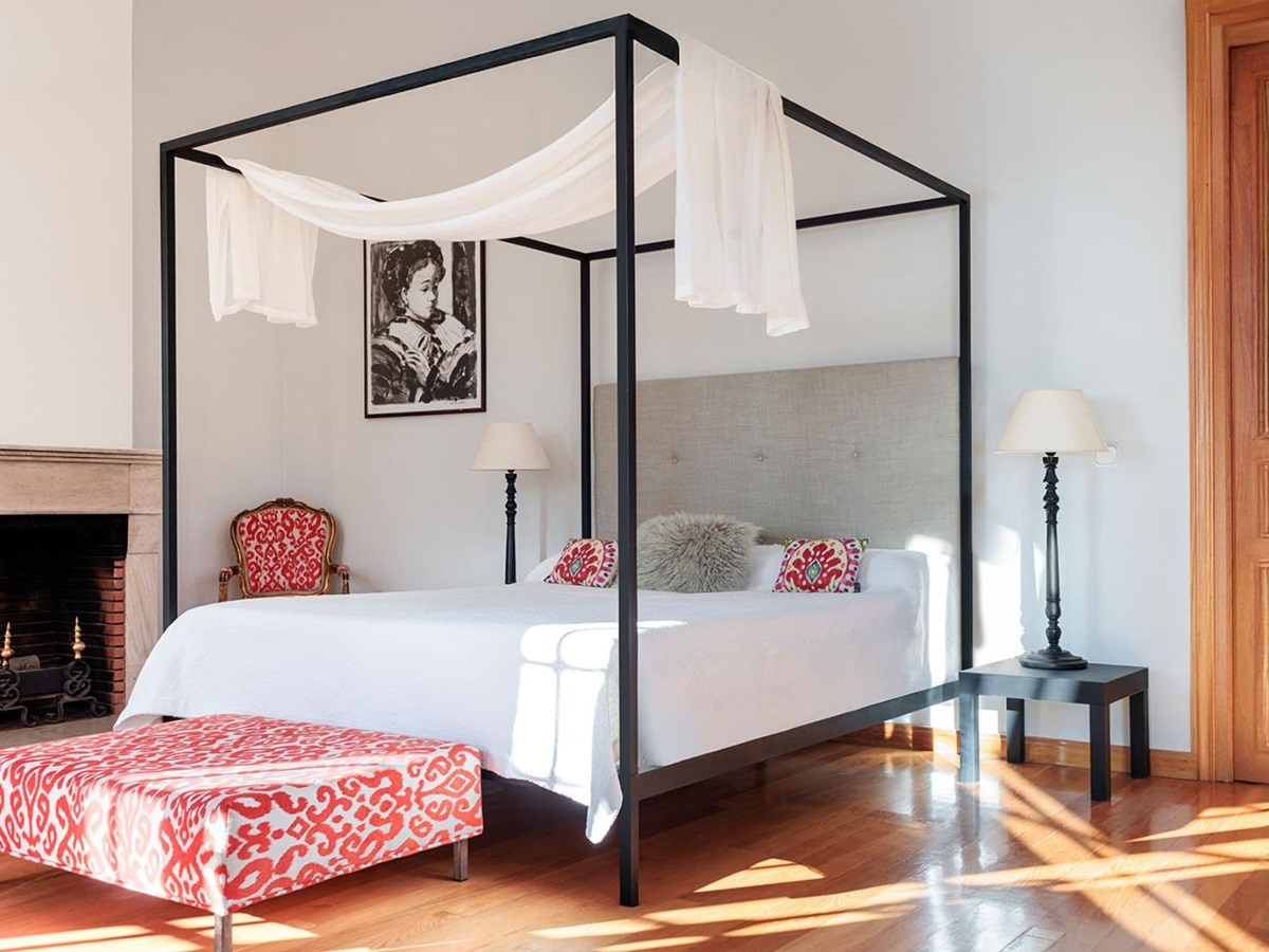 Double bedroom with four poster bed at Finca Jardin Bonito, Andalucia