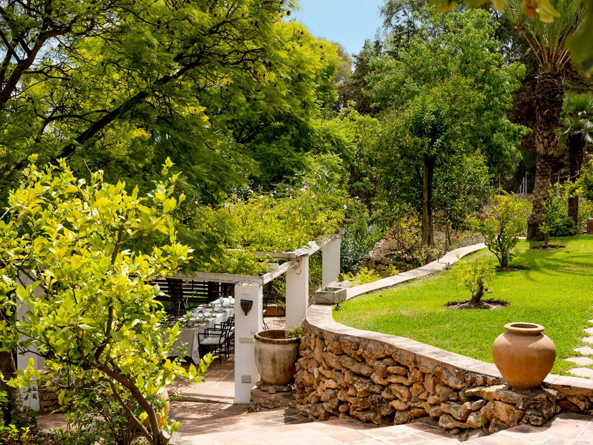 Garden and dining terrace at Finca Jardin Bonito, Andalucia