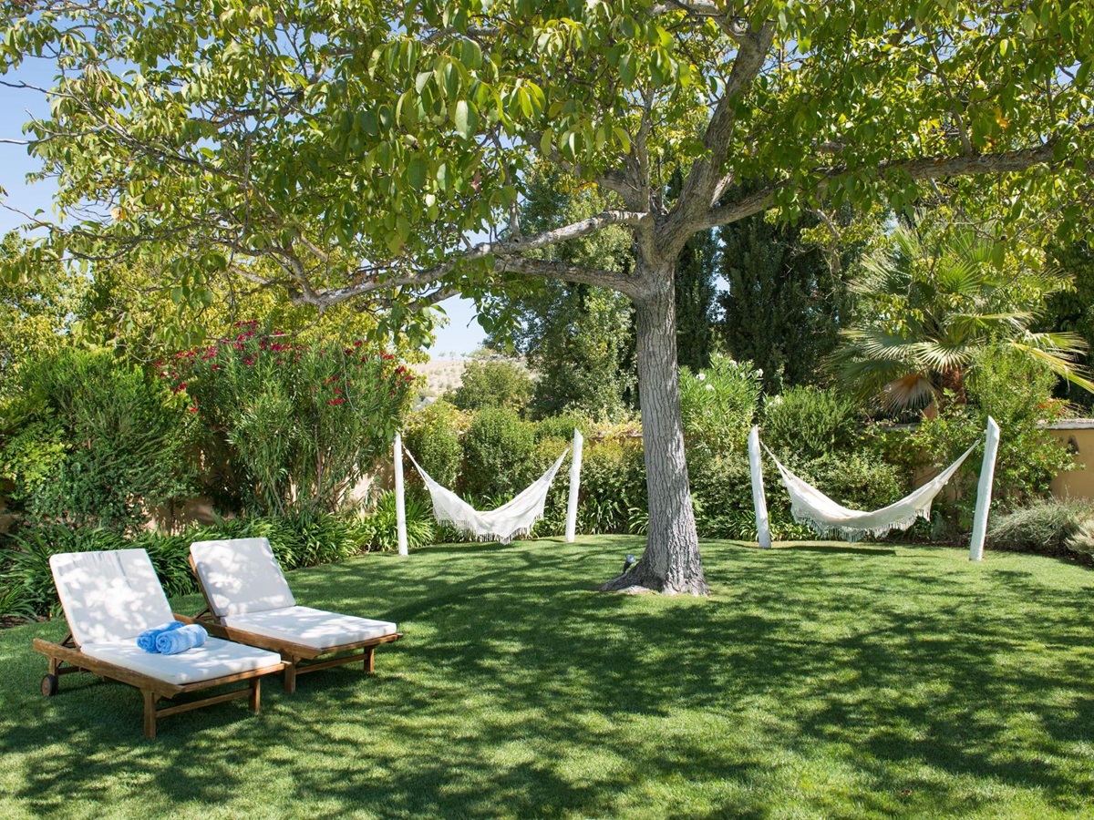 Garden with hammocks at La Huerte el Noque