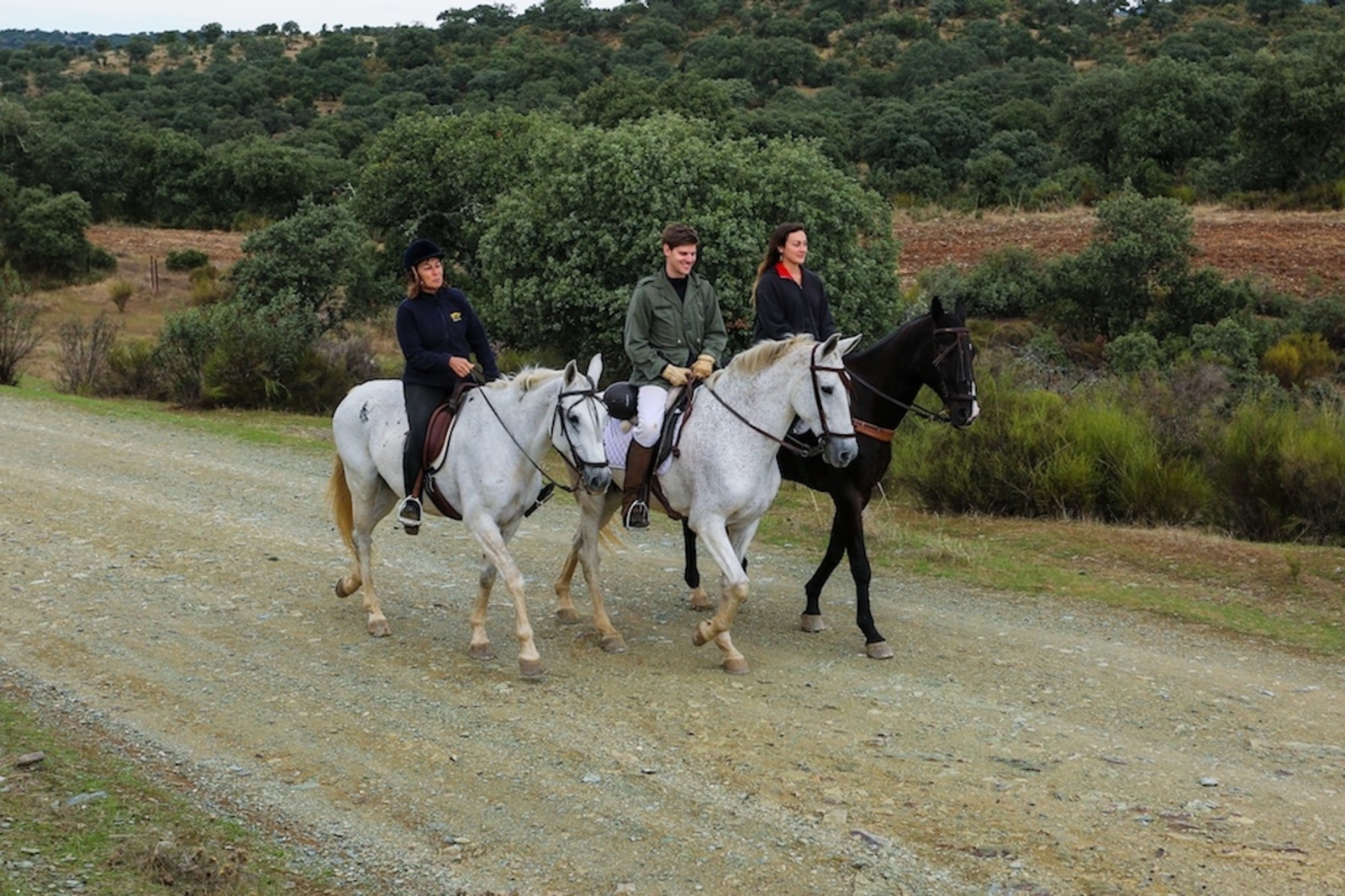 Trio of horse riders in Andalucia in Spain