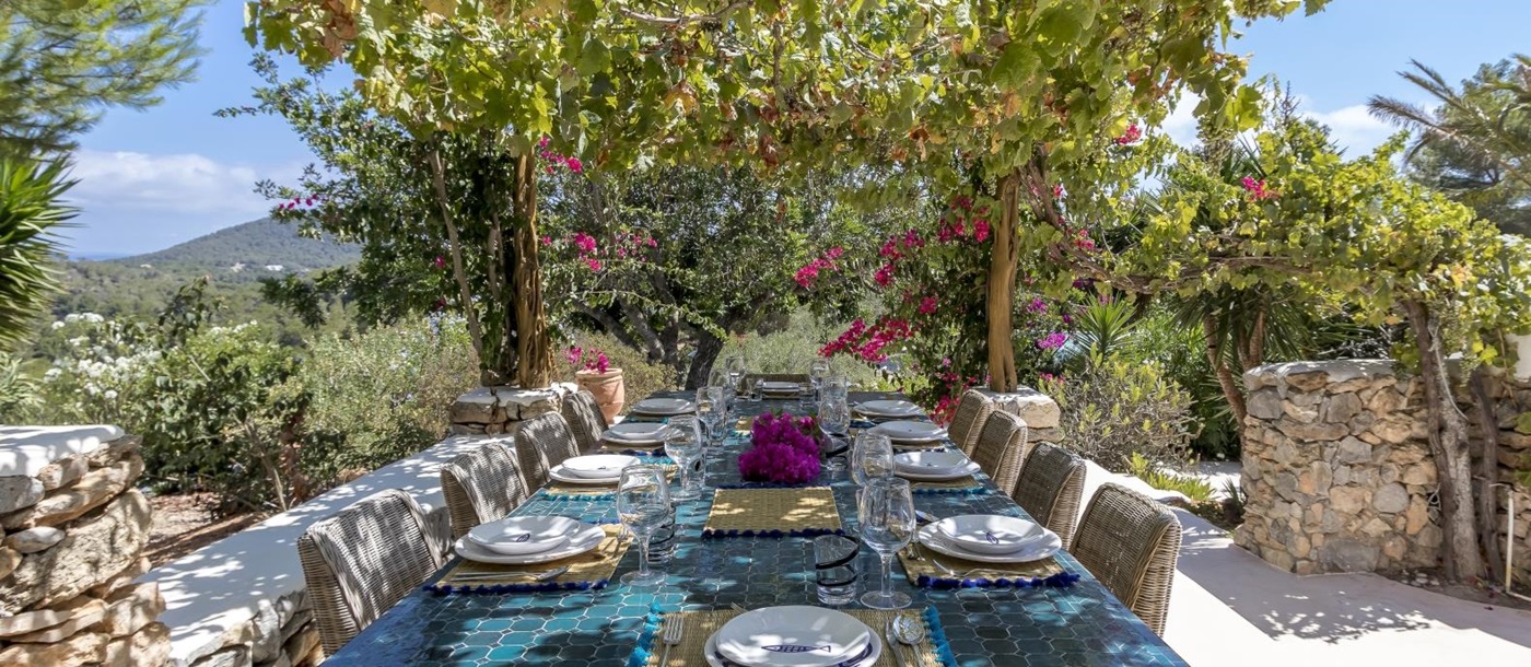 outdoor dining in the dappled shade of trees