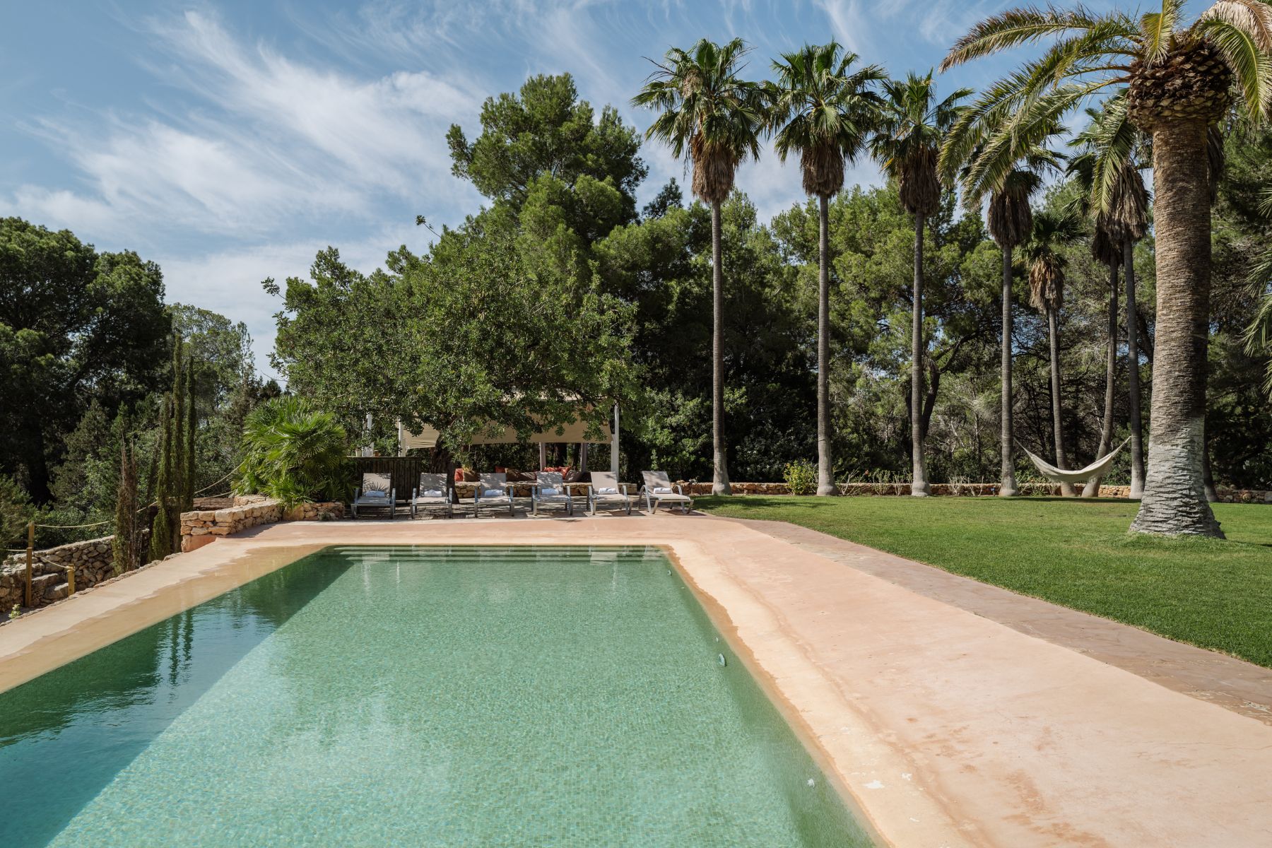 Pool with loungers at Casa Sabena, Ibiza