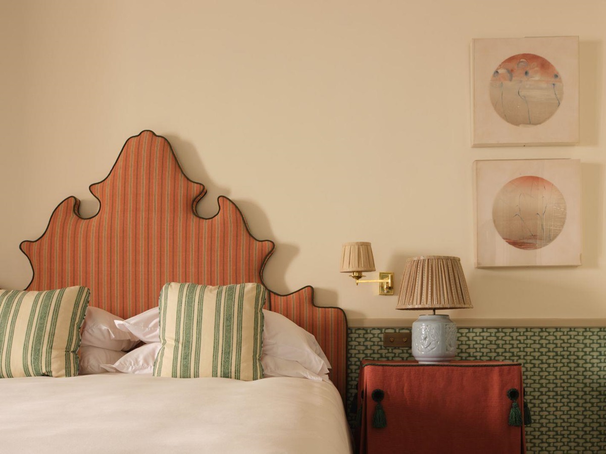 Galatzo pool suite bedroom and side table at Son Net in the Puigpunyent region of Mallorca, Spain