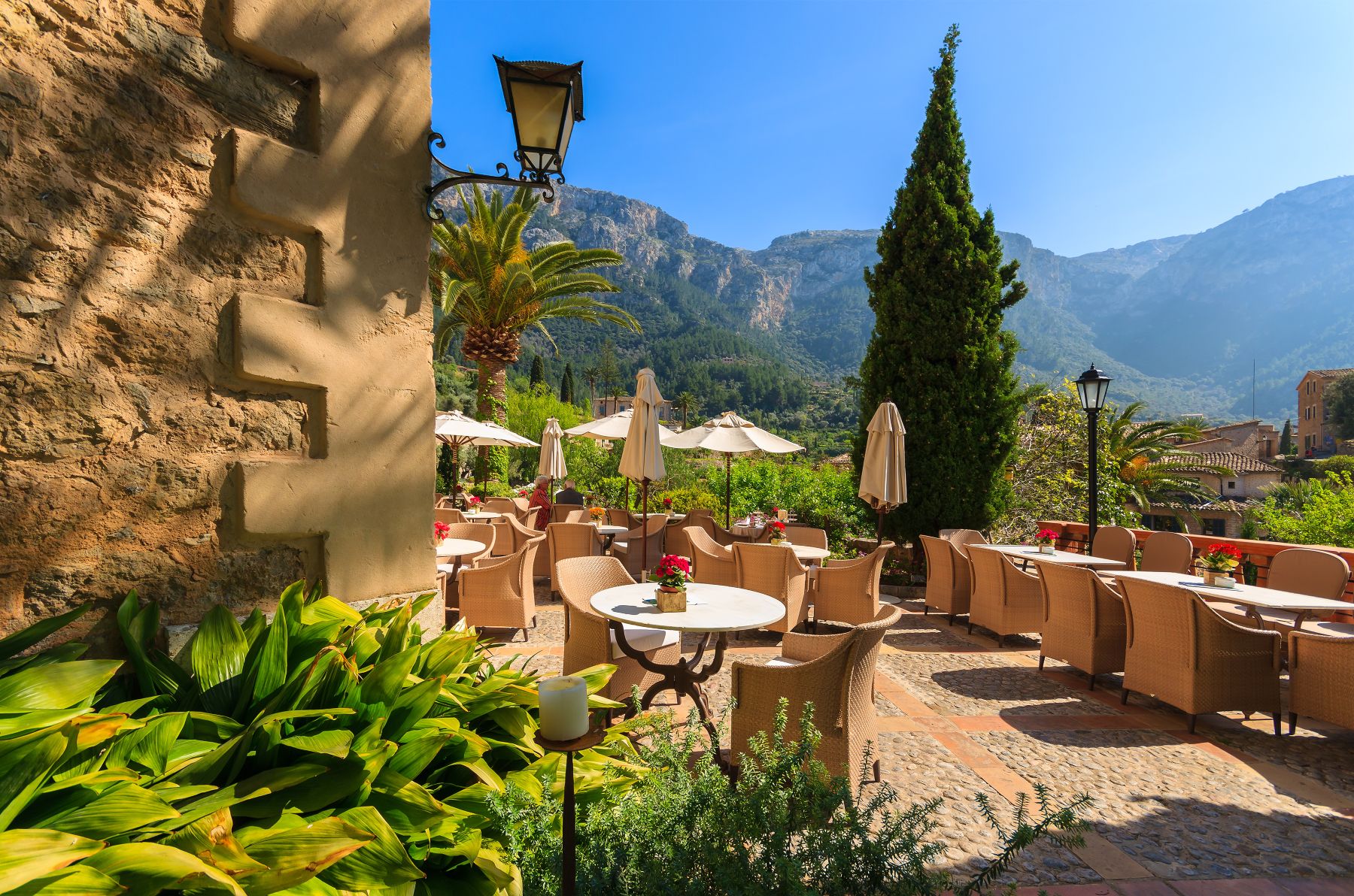 Tables and chairs outside a restaurant in Deia, Mallorca
