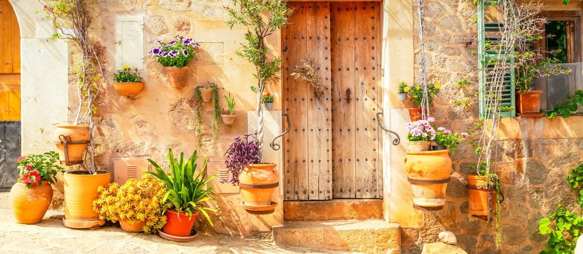 Quaint doorway with pots and plants in Mallorca