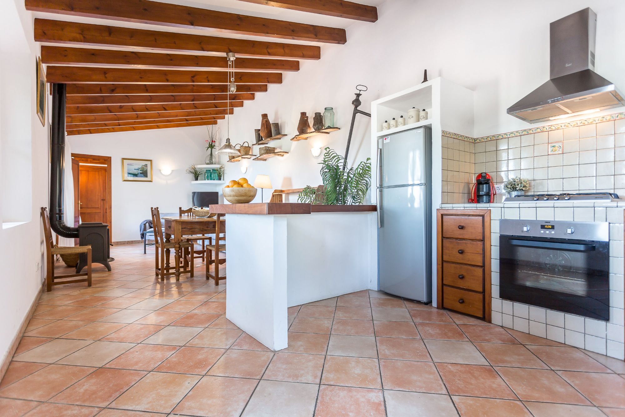 Kitchen and dining area at Can Olivia