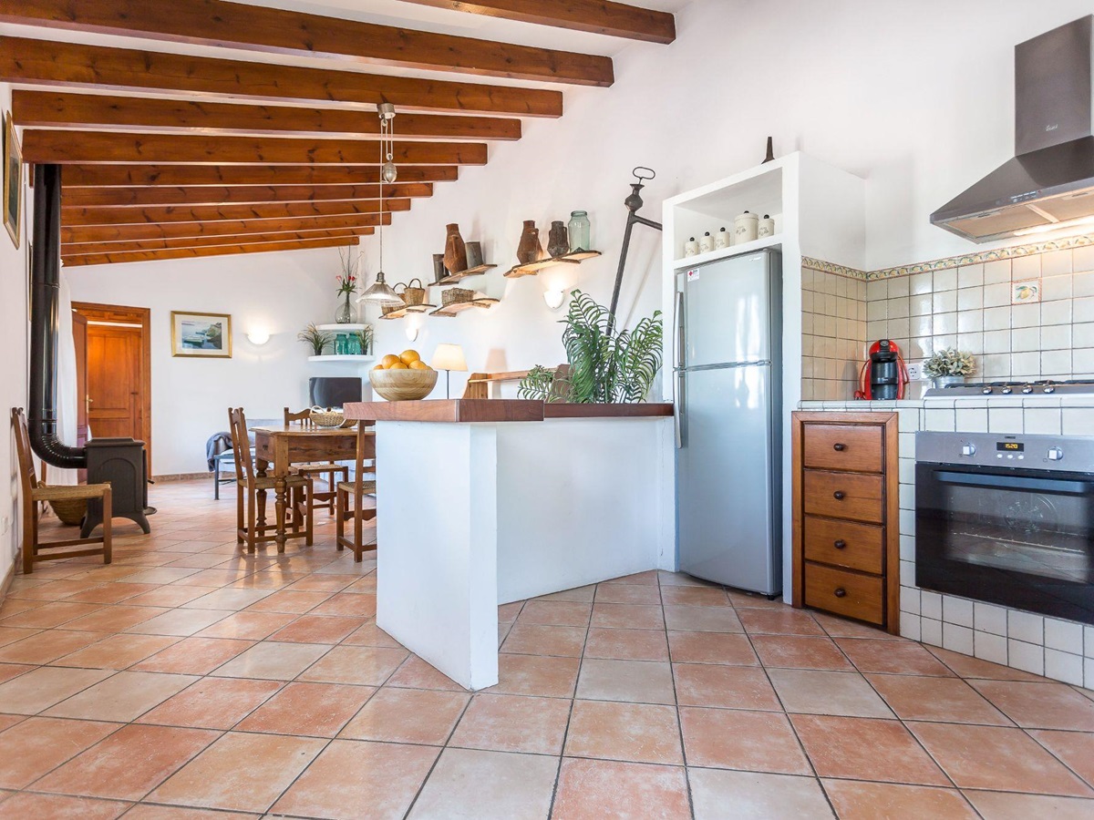 Kitchen and dining area at Can Olivia