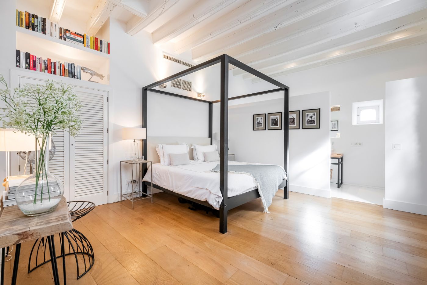 Bedroom with four poster bed at Casa Blanca
