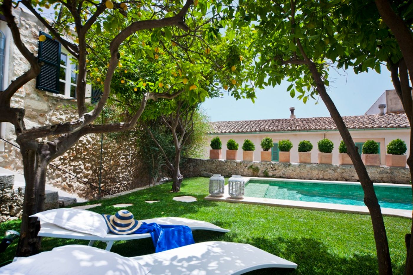Pool with loungers at Casa Blanca 