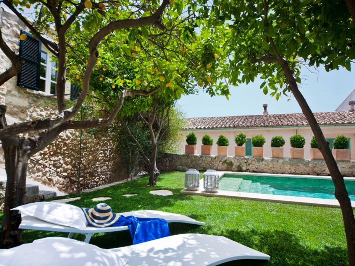 Pool with loungers at Casa Blanca