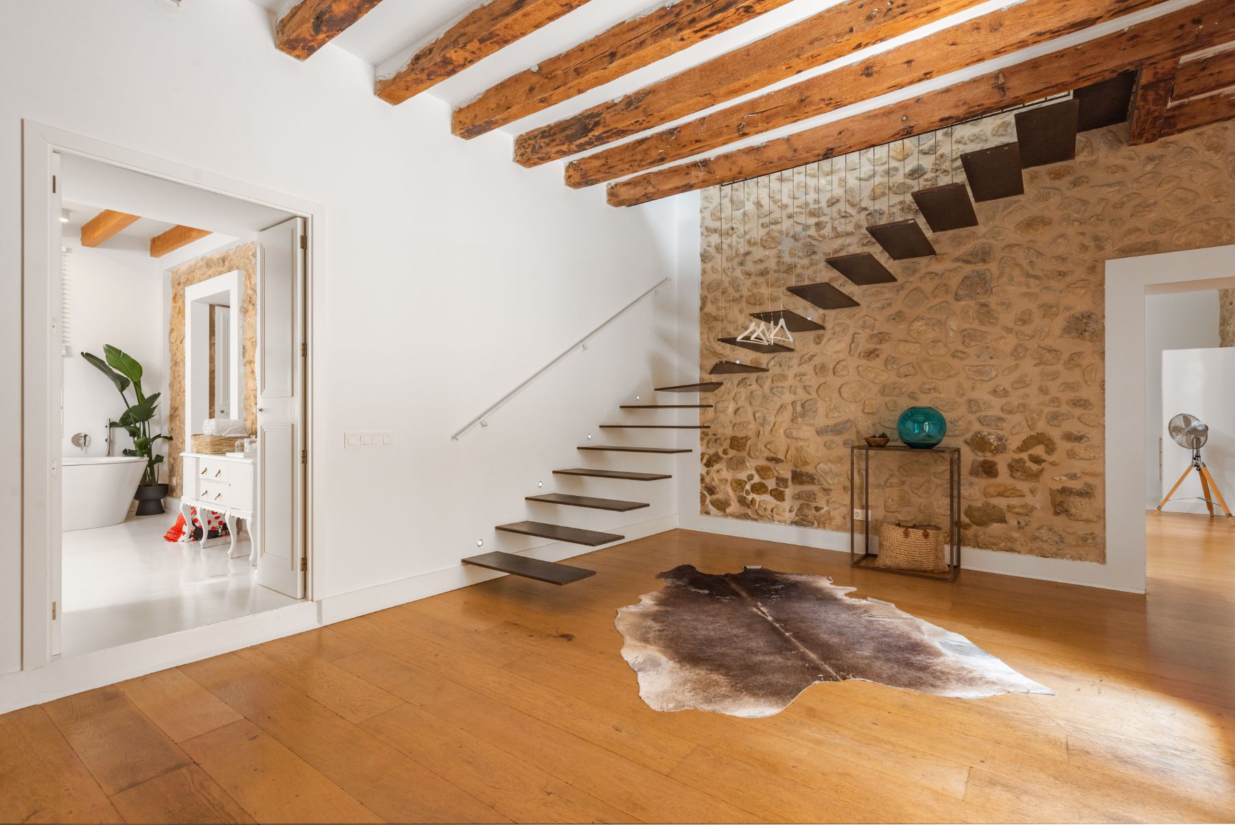 Entrance hall with staircase at Casa Blanca, Mallorca
