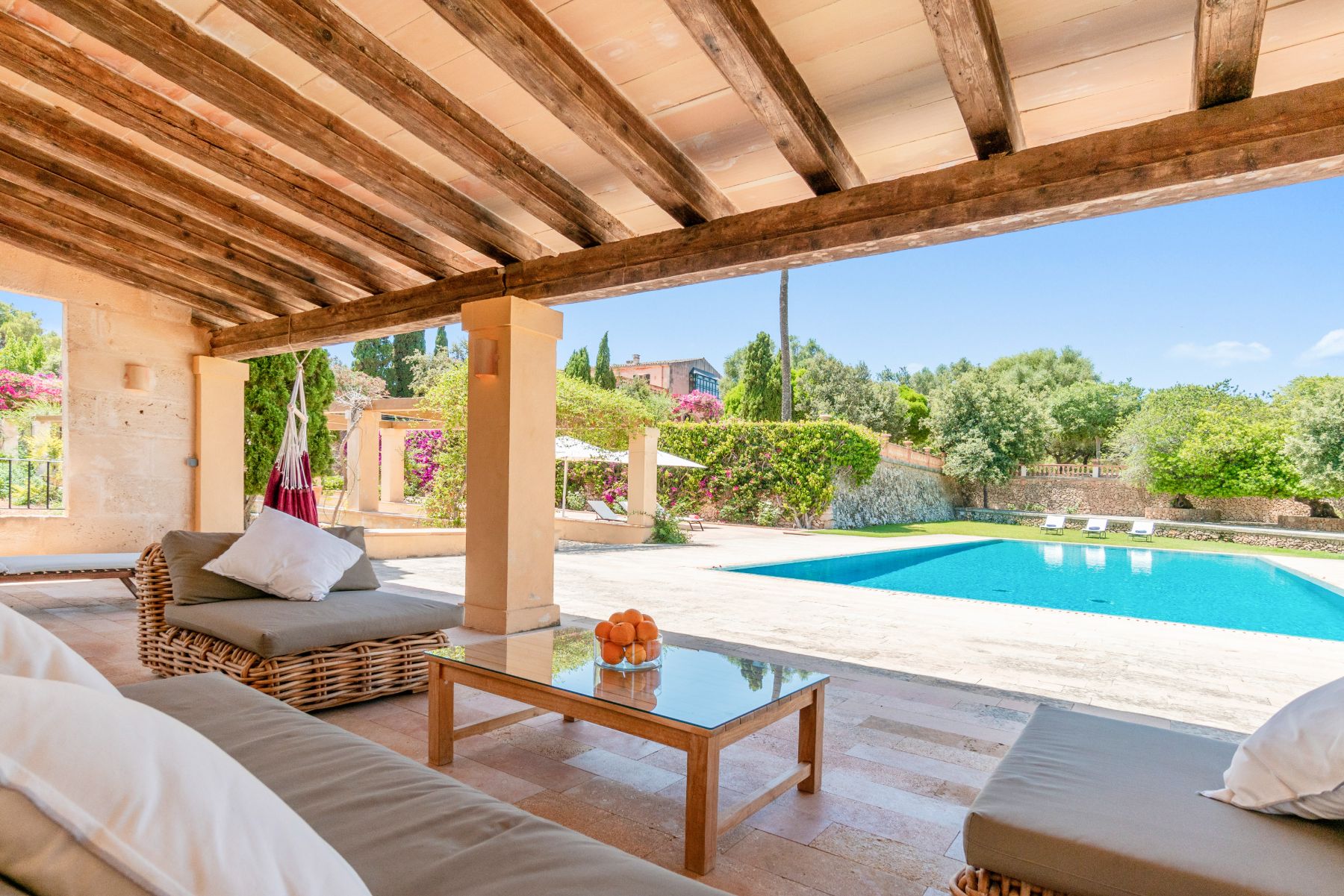 Pool with covered seating area at Casa Jardin Bella, Mallorca