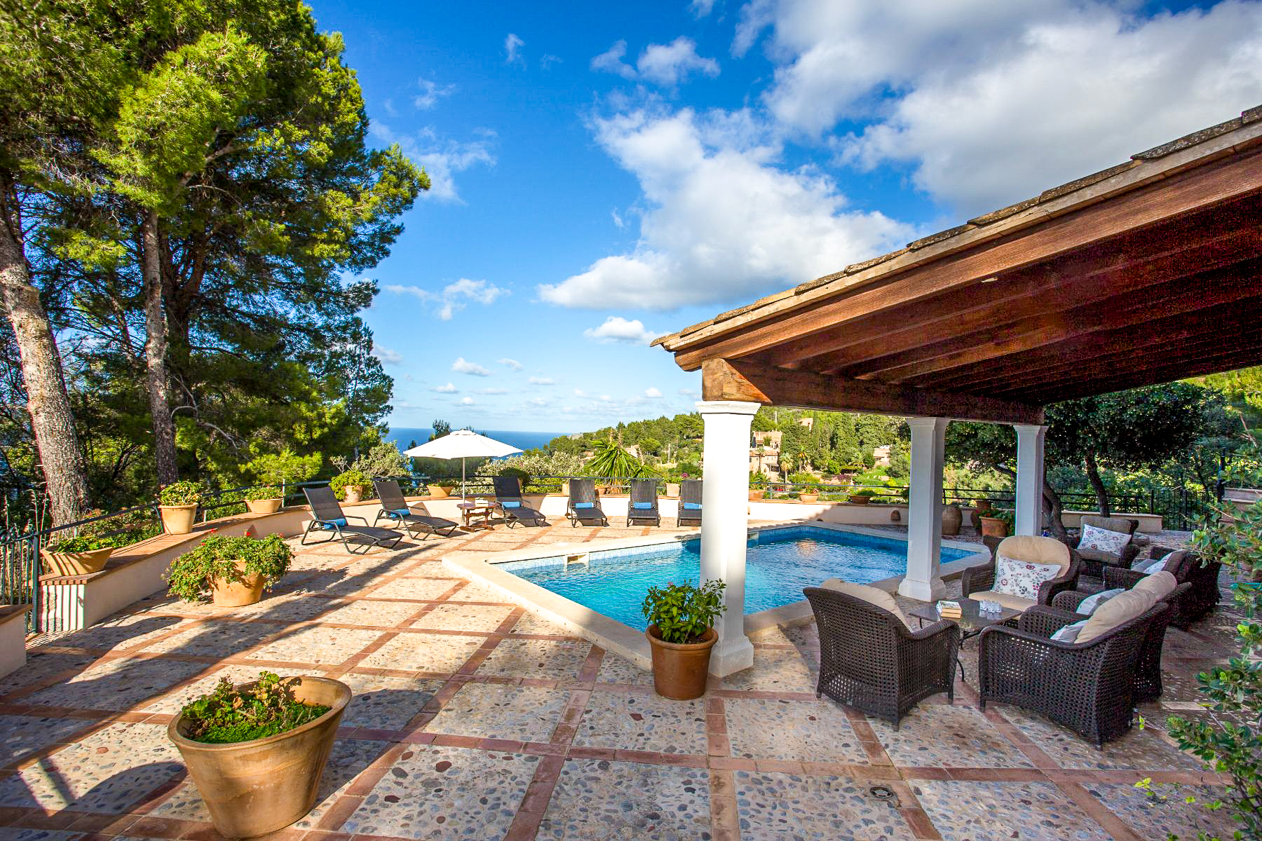 Pool and terrace with seating at Casa Serra, Mallorca