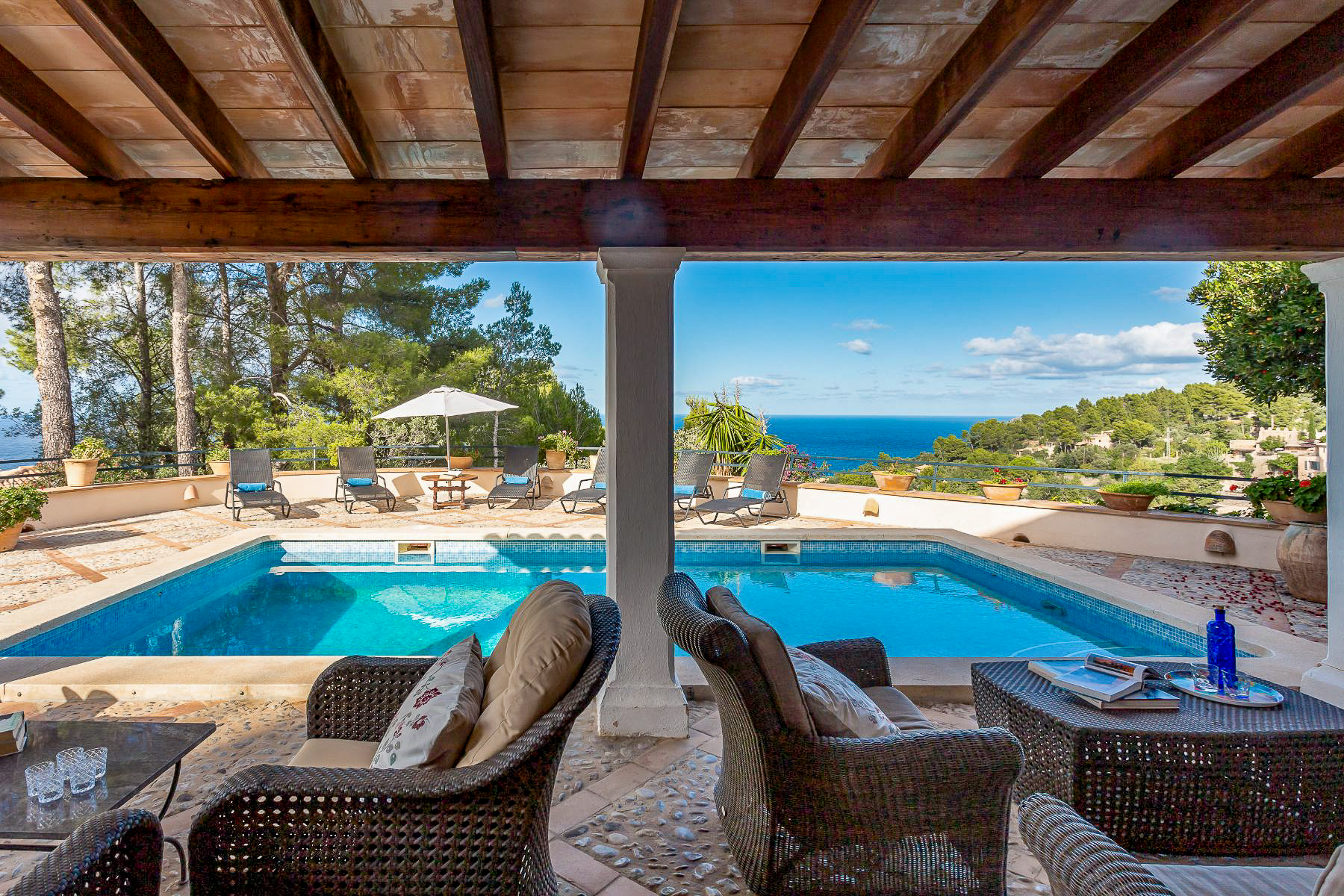 Pool and terrace with seating at Casa Serra, Mallorca