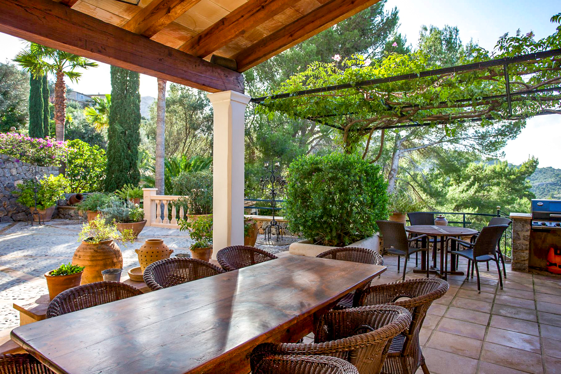 Dining terrace with barbecue at Casa Serra, Mallorca
