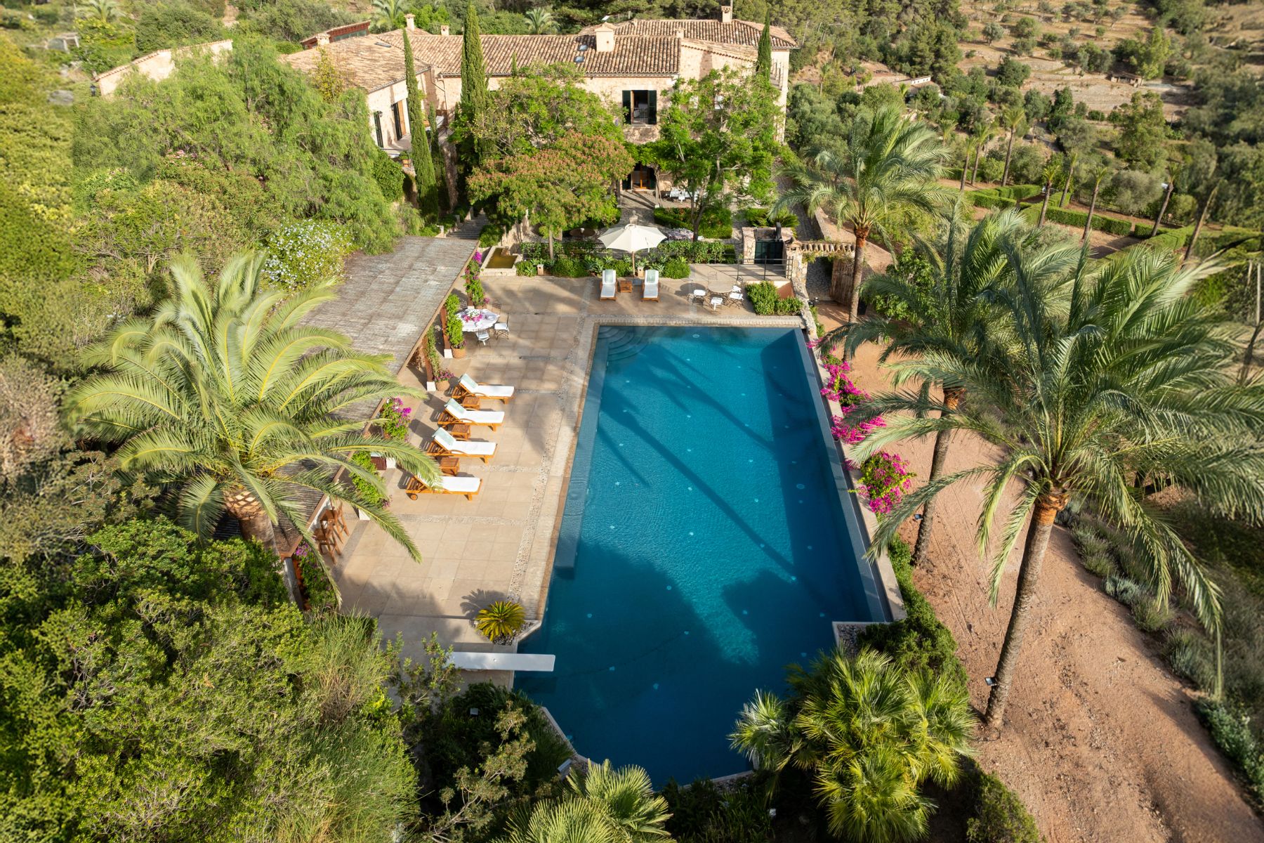 Pool and sun loungers at Finca Olivera, Mallorca