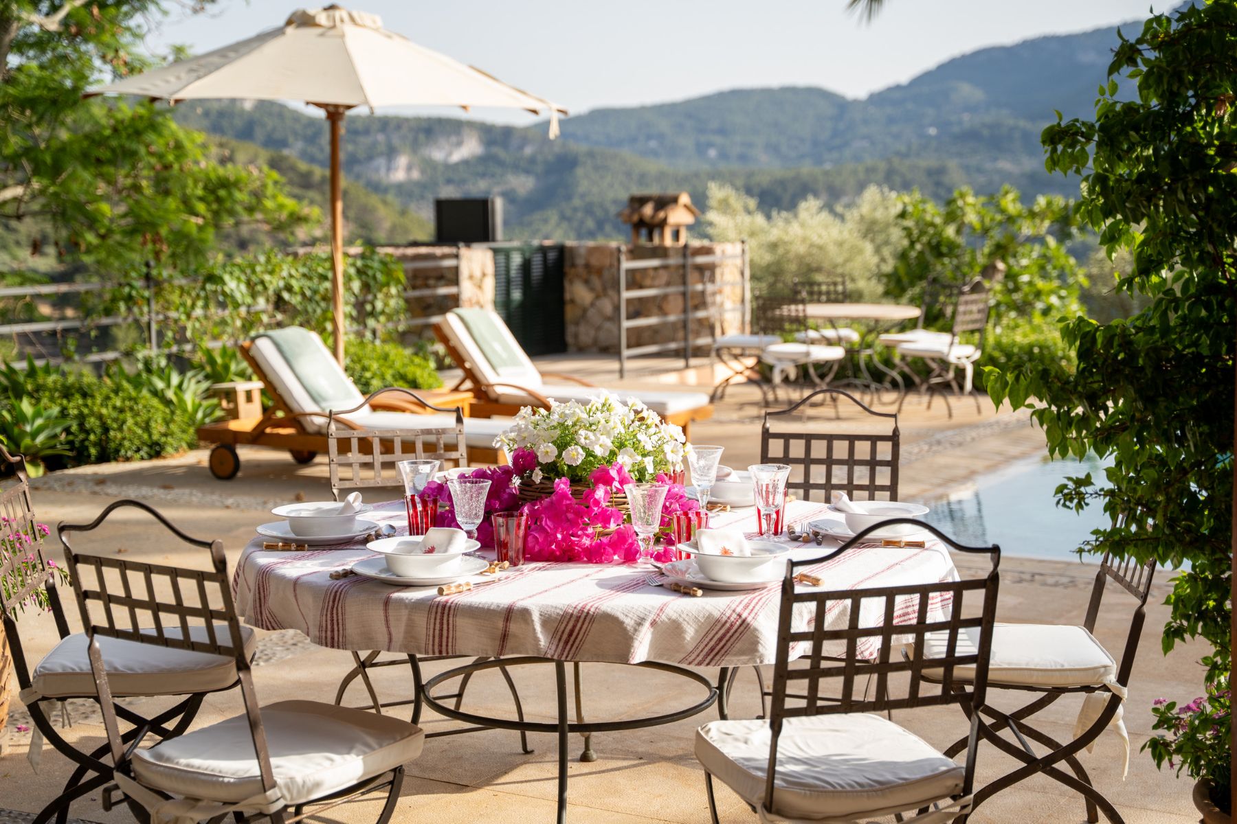 Dining table on pool terrace at Finca Olivera, Mallorca