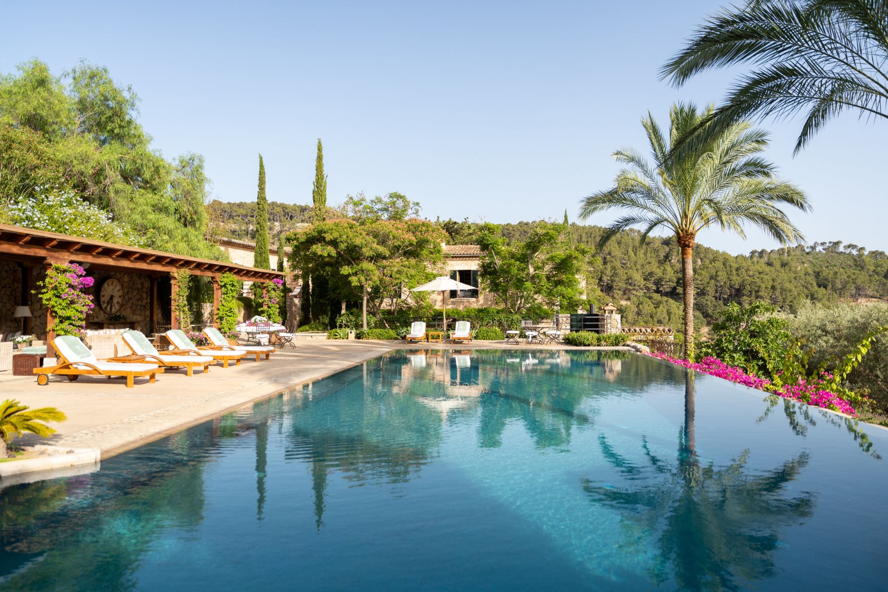 Pool and sun loungers at Finca Olivera, Mallorca