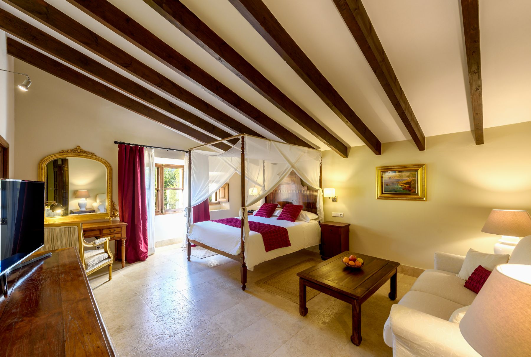 Double bedroom with four poster bed at Finca Paraiso, Mallorca