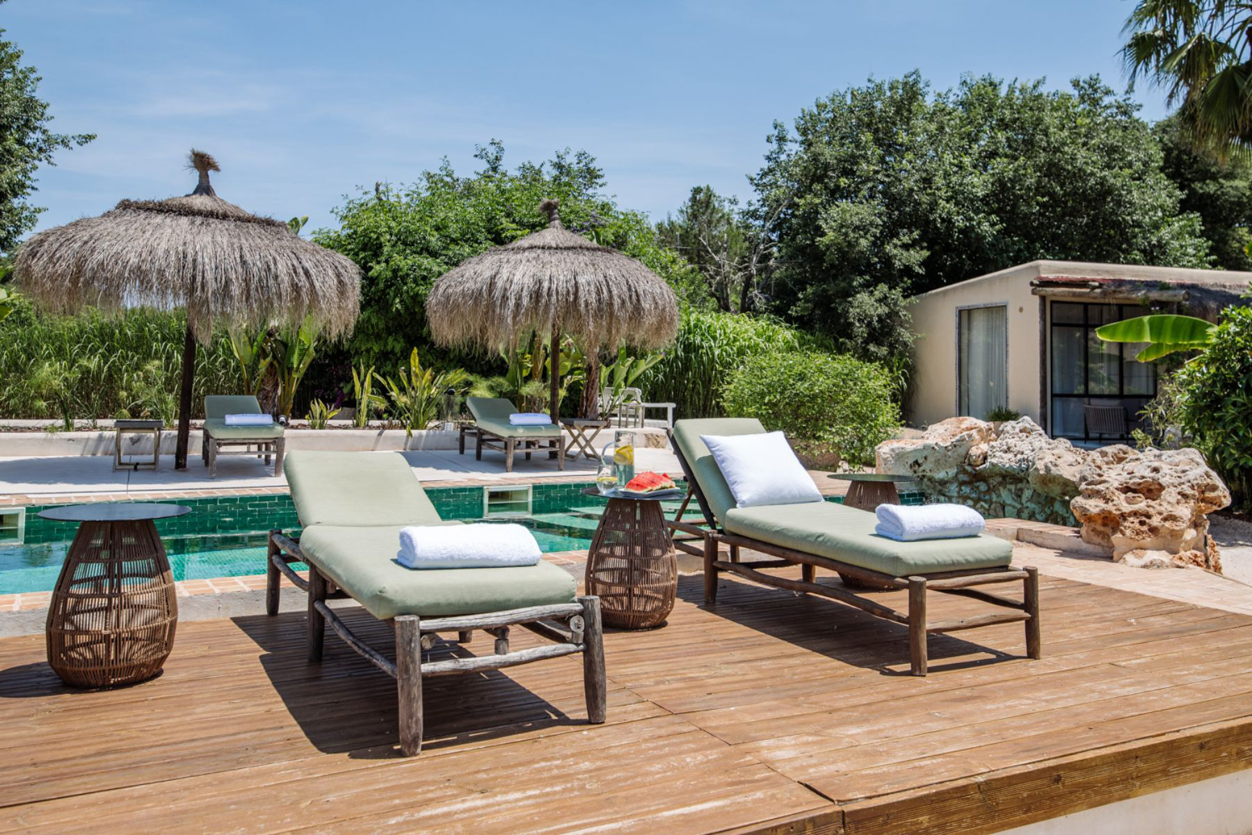 Pool with sun loungers at Finca Romani, Mallorca