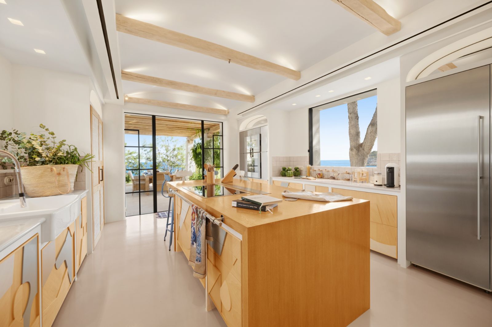 Kitchen with island at Sa Font, a luxury villa in Mallorca