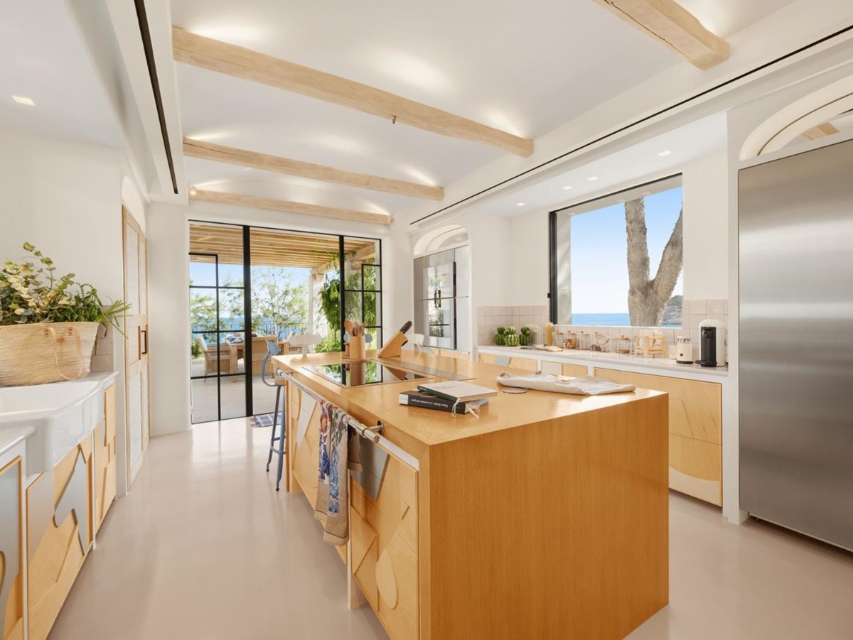 Kitchen with island at Sa Font, a luxury villa in Mallorca