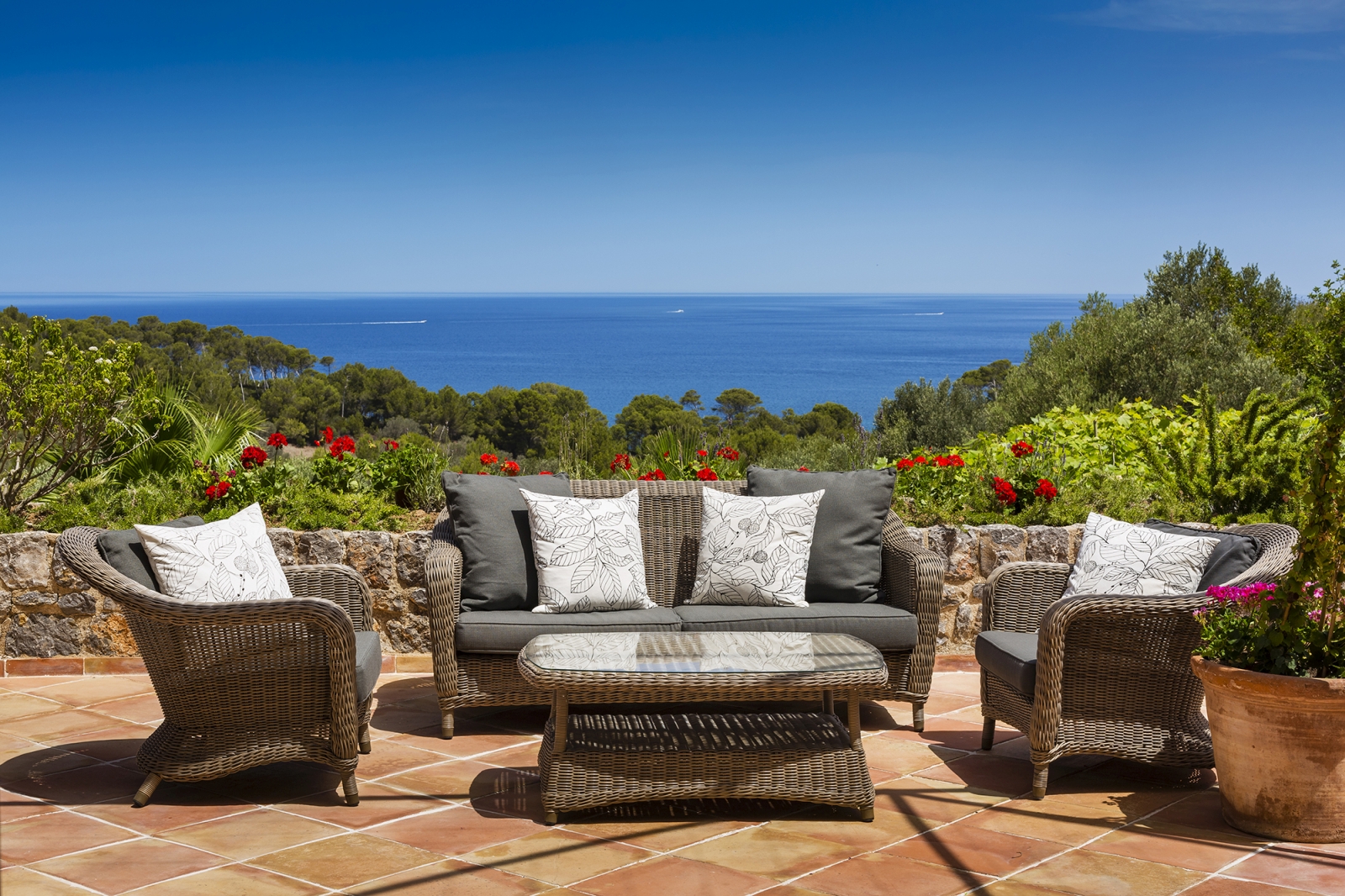 Terrace seating area with views over the surrounding area and the Mediterranean Sea
