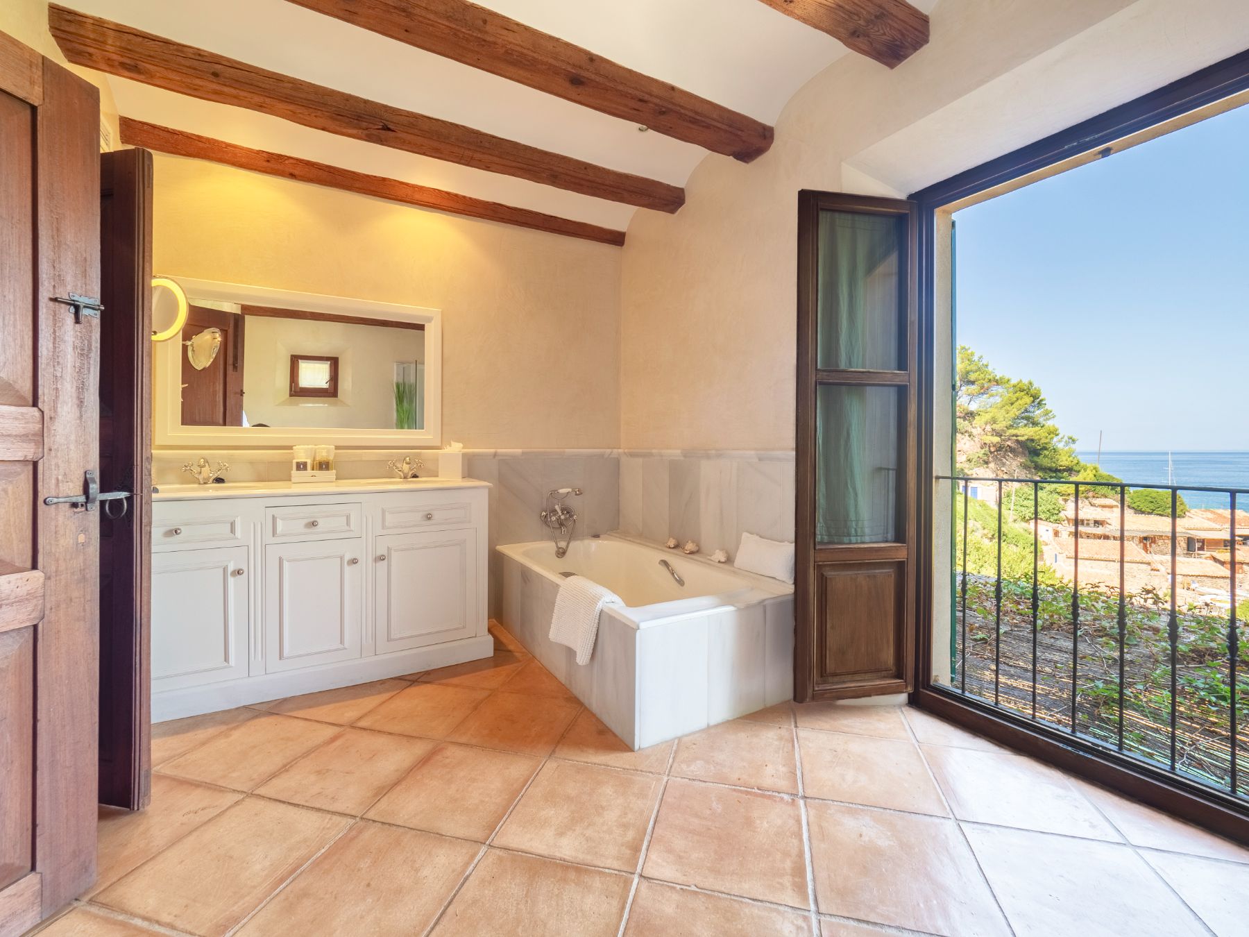 Bathroom with sea view at Villa Caleta, Mallorca