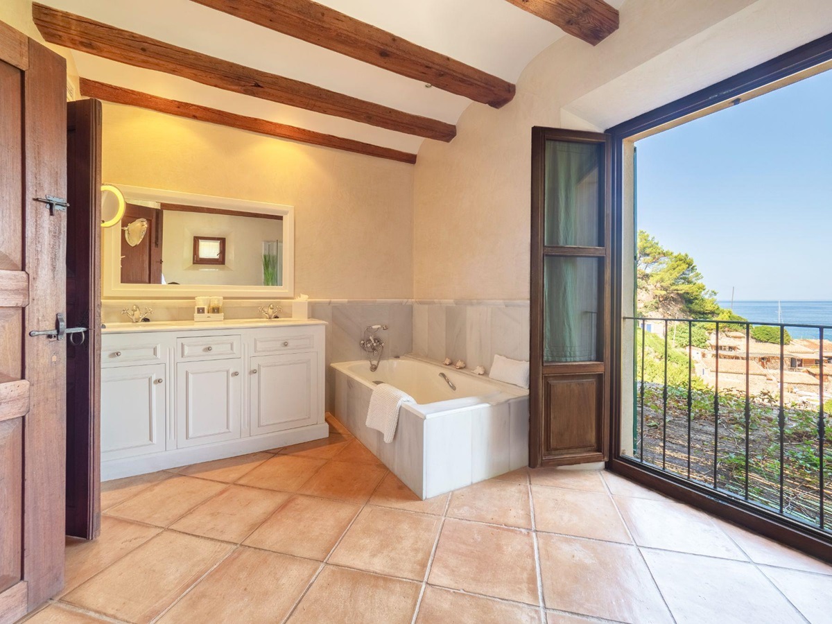 Bathroom with sea view at Villa Caleta, Mallorca