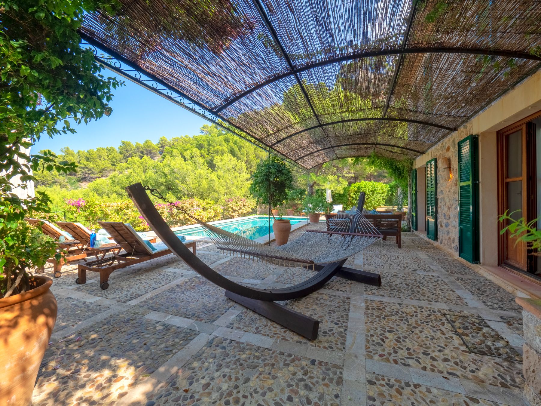 Terrace with hammock at Villa Caleta, Mallorca