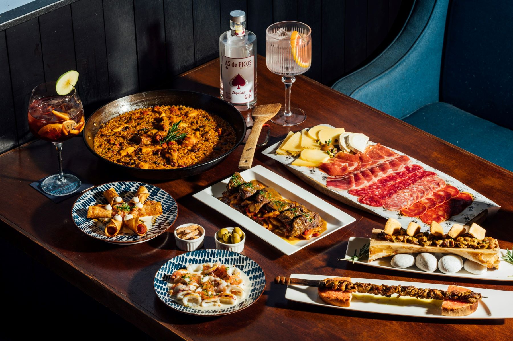 A selection of Spanish tapas dishes set out on a table